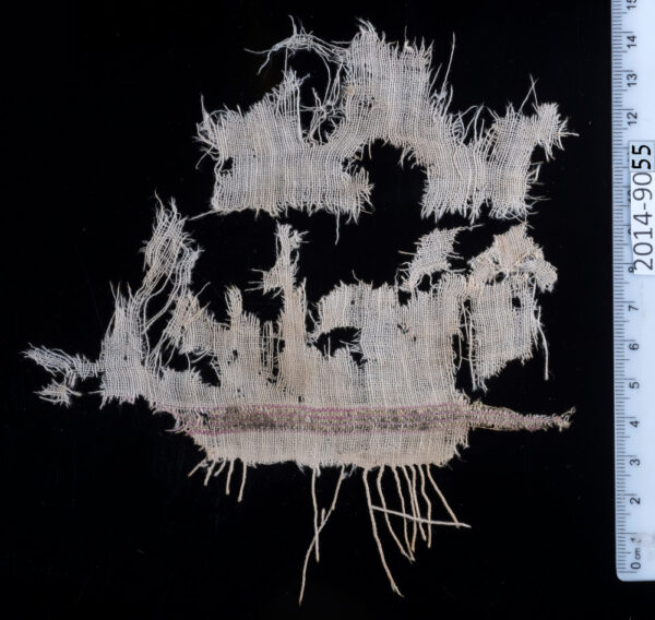 A cotton textile decorated with red cotton bands (alternating with shiny silk, S-spun threads wound with silver strips, 'En Marzev. Photo by Clara Amit and Tzila Sagiv, courtesy of the Israel Antiquities authority