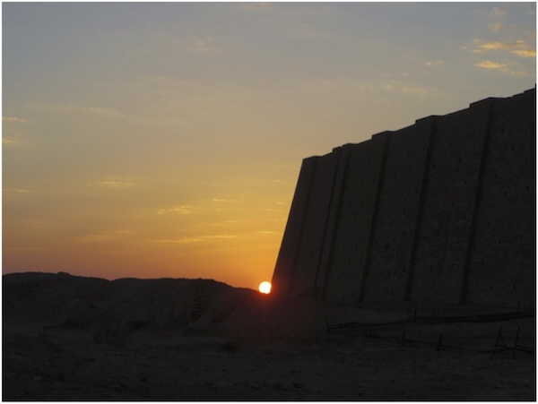 The sun setting behind the ziggurat of Ur. Image courtesy of Mary Shepperson.