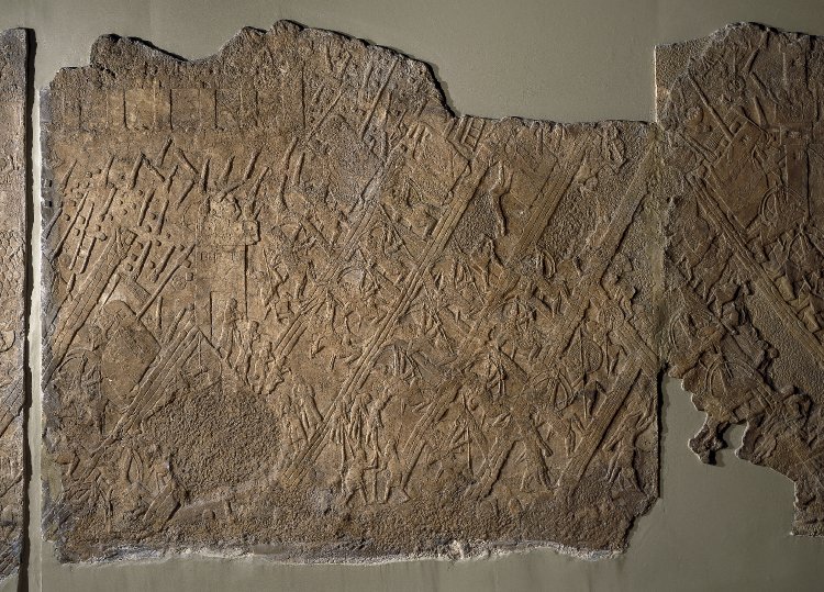 The siege of Lachish. Gypsum wall panel from the palace of Sennacherib at Nineveh. British Museum 124906. © The Trustees of the British Museum, CC BY-NC-SA 4.0