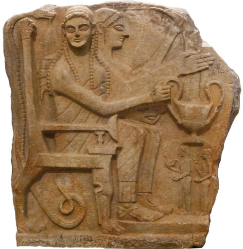 Funerary relief from Chrysapha (Sparta), probably representing enthroned Hades and Persephone/Kore. The goddess holds a pomegranate in her right hand (550-540 BCE).