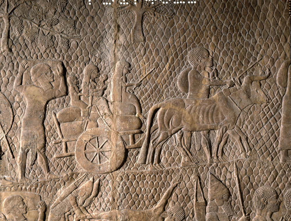 Exiles leaving Lachish. Wall relief from the palace of Sennacherib, Niniveh. © The Trustees of the British Museum