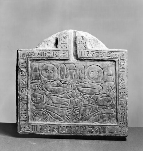 Stone offering table, Walters Art Museum 2291. Note that the table takes the shape of the hetep hieroglyph. Carved on the table top are a variety of types of food and another representation of the hetep hieroglyph (at the top of the table and upside down to the viewer). Public Domain via Wikimedia.