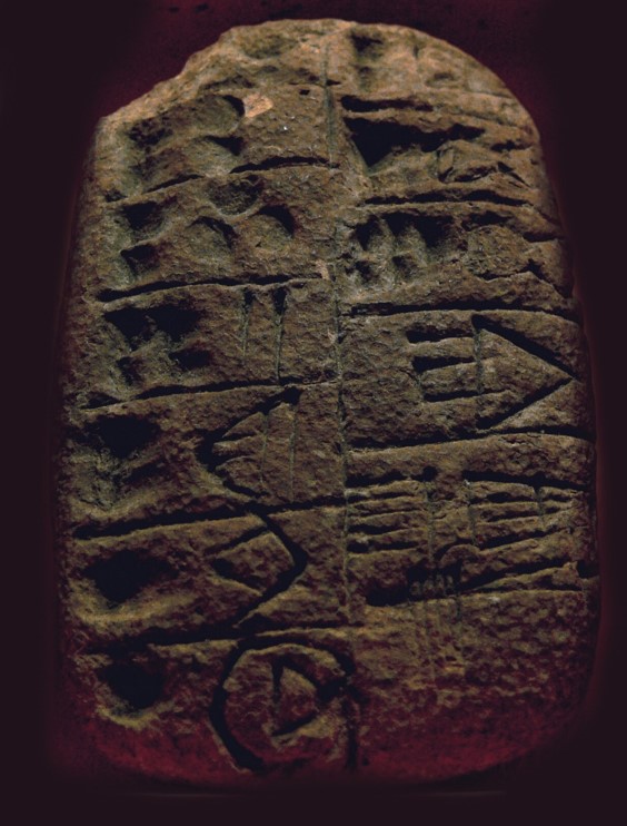 Very early cuneiform: an accounting tablet from Uruk III (late fourth millennium BCE). Public Domain via Wikimedia.
