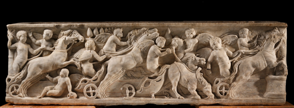 Marble sarcophagus for a child with scenes of cupids racing chariots in the setting of a circus, probably the Circus Maximus. Marble. 160-180 C.E. Dimensions: L 53 in.; H 15 in.; Depth 19 ½ in.; Th sides 2 ¼ - 2 ½ in. Toledo Museum of Art (Toledo, Ohio), Purchased with funds from the Libbey Endowment, Gift of Edward Drummond Libbey, by exchange, 2008.129. Image © Toledo Museum of Art.