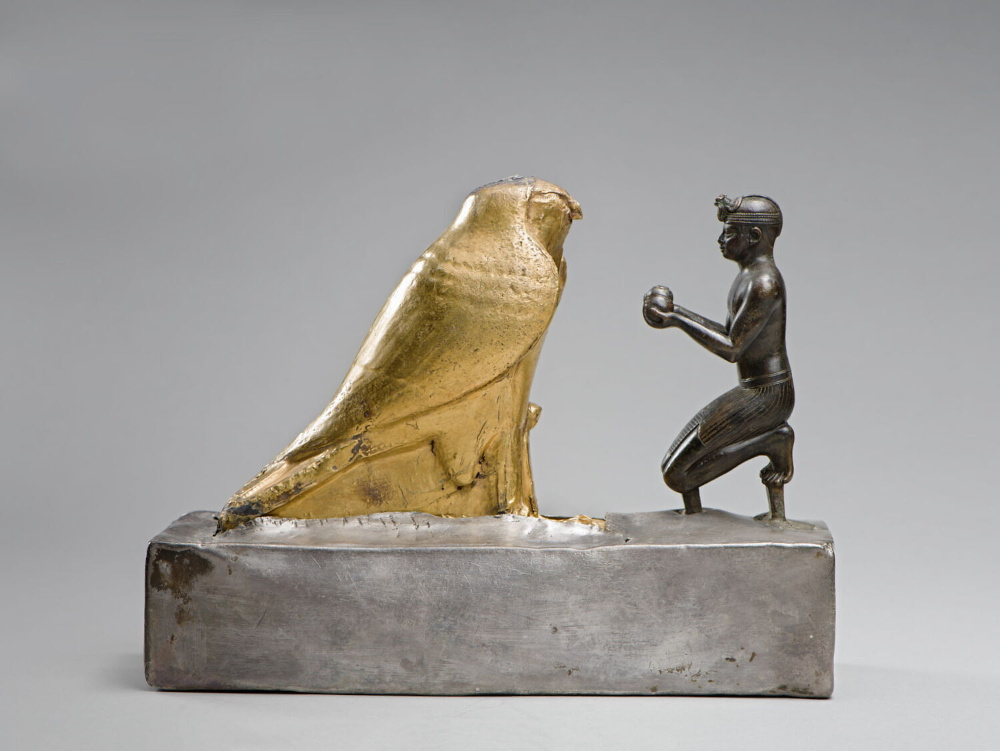Taharqo and the Falcon God. Ca. 690-664 BCE. Louvre E 25276. © 2021 Musée du Louvre, Dist. GrandPalaisRmn / Christian Décamps
