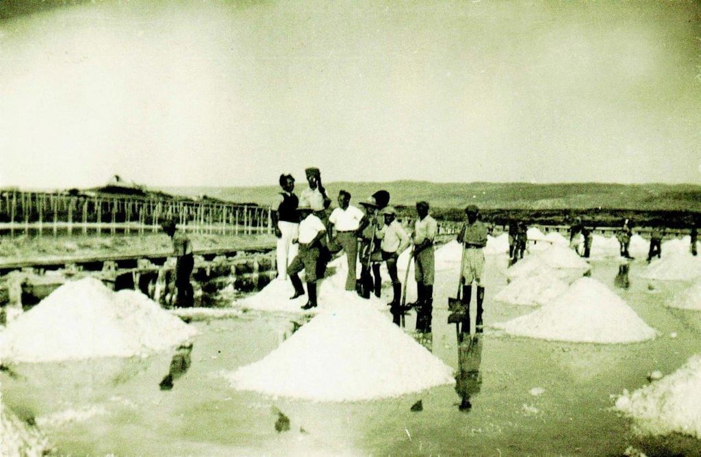 Piling the salt at harvesting, Atlit, early 20th century (Salt of the Earth)