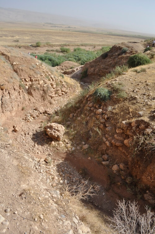 View from the west of the newly discovered Assyrian aqueduct on the Wadi Dar Basta from the west (Land of Nineveh Archaeological Project archive).