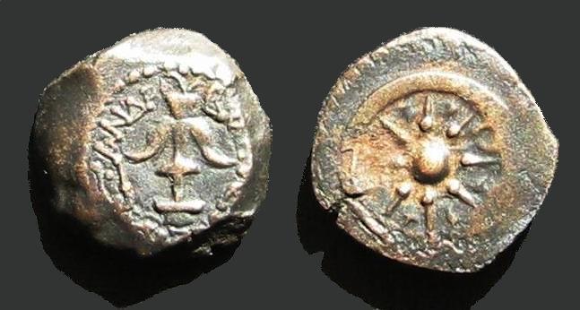 Coin of Alexander Jannaeus (103 to 76 BCE). Obverse: Seleucid anchor and Greek Legend: BASILEOS ALEXANDROU "King Alexander". Reverse: Eight-spoke wheel or starburst within diadem. Hebrew legend inside the spokes: "Yehonatan Hamelech"(Yehonatan the King). Photo by PHG / wikimedia, CC BY-SA 3.0.