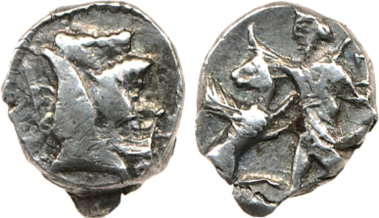 Samarian Silver coin. Head of bearded satrap left, wearing tiara. Persian king standing left, fighting horned creature. © The Trustees of the British Museum.