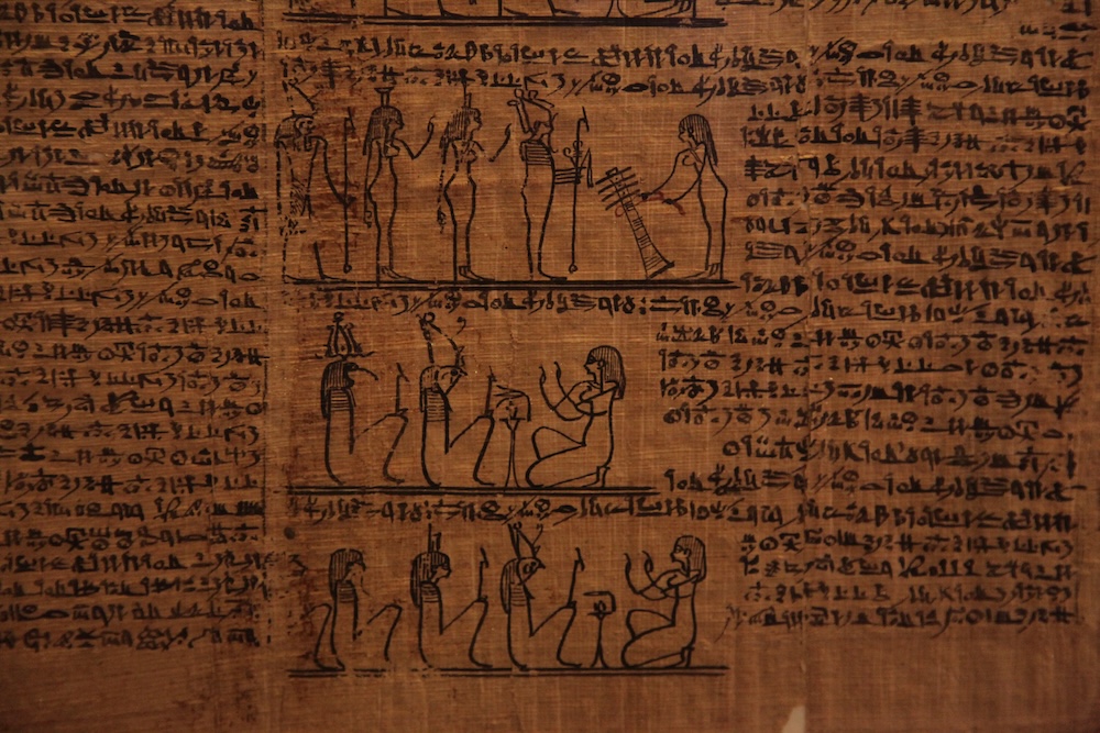 The owner (right) performs ritual services for groups of gods in text and image in a 4th-century BCE Book of the Dead manuscript. Photo by Rana, CC By-SA 3.0.