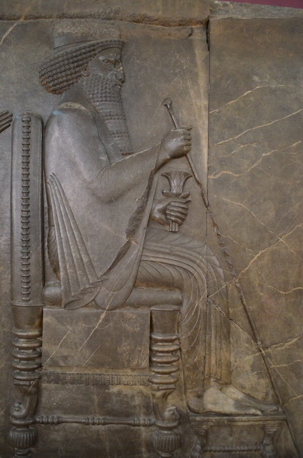 Rock relief of an Achaemenid king, most likely Xerxes. Photo by Darafsh via Wikimedia Commons (CC BY 3.0).