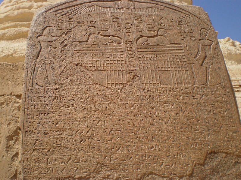 Dream Stela of Thutmosis IV. The upper part shows the pharaoh offering to the sphinx. (Giza, Egypt. Photo courtesy of author).