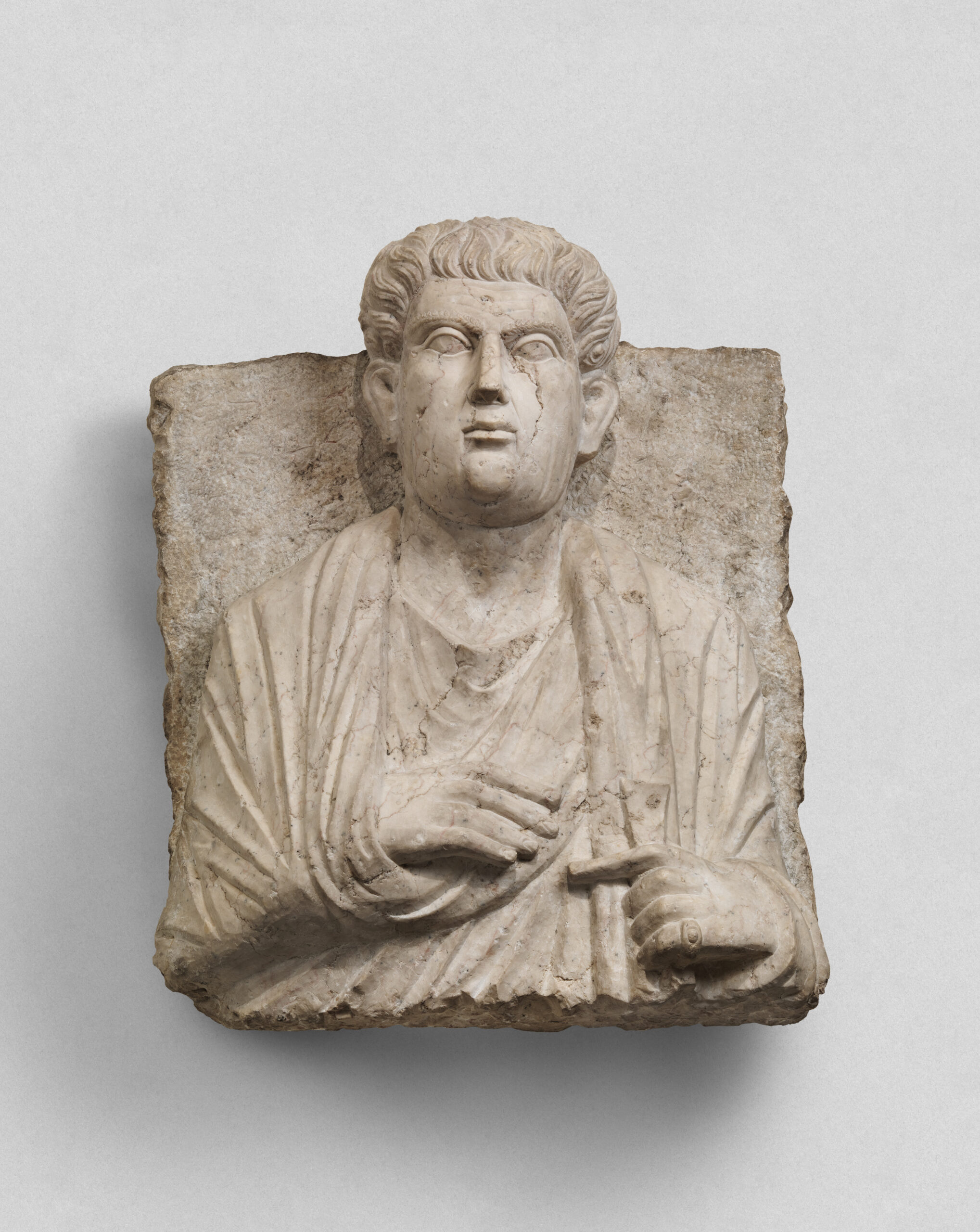 Palmyrene Funerary Portrait. Limestone. Second Century AD. 20.51 × 17.01 in. (52.1 × 43.21 cm) (The Metropolitan Museum of Art, 02–29.2).