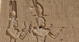 Cleopatra dressed as Hathor with her son Caesarion pay homage to the gods. Relief on the temple at Dendera, Egypt (Photo: Olaf Tausch via Wikimedia Commons, CC BY 3.0 DEED. Photo has been cropped).