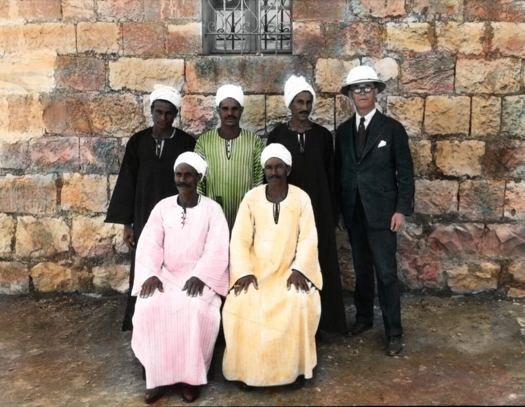 Figure 6. Egyptian foremen of the 1932 season. Seated, left to right: Reis Metwelli Ahmed and Reis Abed-el Rahman. Standing, left to right: Reis Mahmud Khalil Mohammed, Reis Ahmed Abu Zeid Rashwan, and Reis Mahmoud Abdel Azim Tantawi. Badè Museum photographic archive 507 N P.I. 824. Colorized lantern slide. Courtesy of the Badè Museum, Pacific School of Religion.