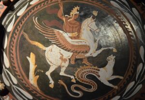 Bellerophon wearing the “Phrygian cap” (indicating his Anatolian affiliation) attacking Chimera while riding Pegasus. Red-figure plate, c. 350-300 BCE, Palazzo Massimo alle Terme. (Photo: C. Raddat z; CC By-SA 2.0)