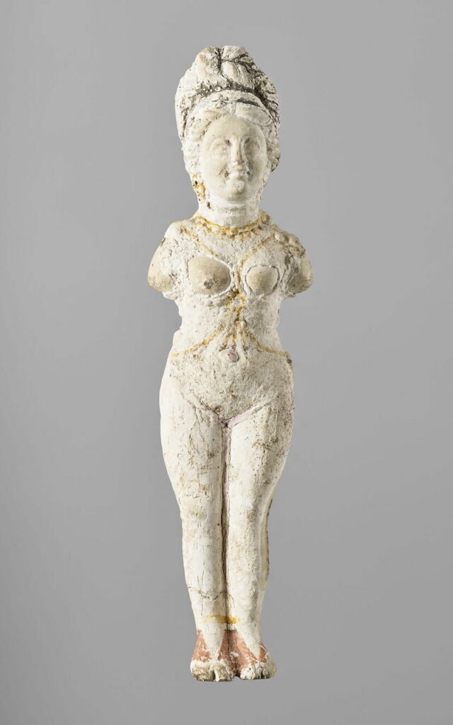 Figure 5. Nude standing female figurine, with arm stumps finished-off below the shoulder. Uruk (Iraq), terracotta, c. 1st-3rd century CE. Height: 16cm. Louvre AO 18590. Photo: © 2022 RMN-Grand Palais (musée du Louvre) / Adrien Didierjean