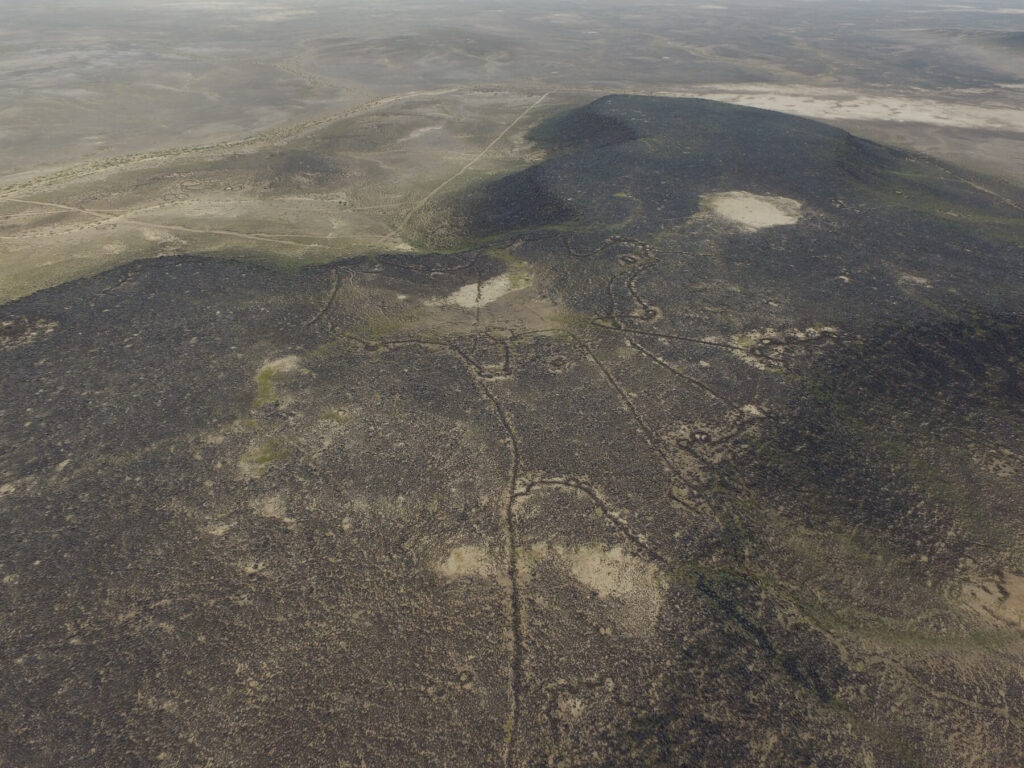 Figure 4. Kite built to funnel animals up slopes into enclosure atop Mesa 2. Photo by A. C. Hill