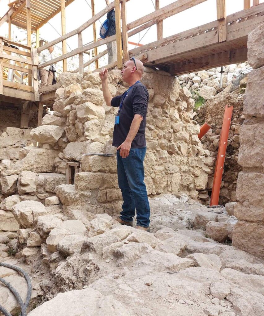 Dr. Yiftah Shalev shows us around the excavations at the Givati Parking Lot site, on the northwestern side of the Old City. (Photo by M. van den Berg)