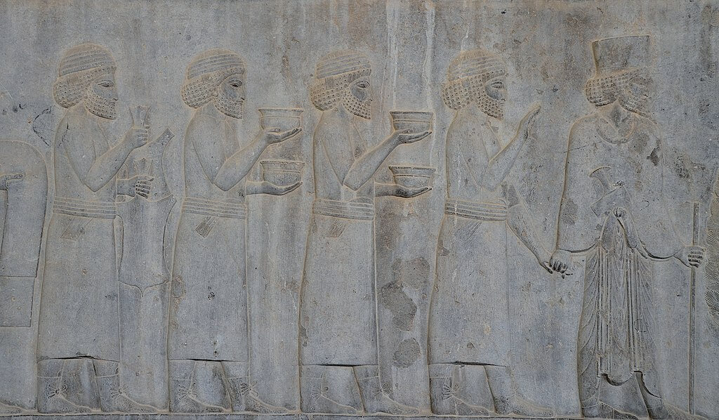 Relief on the southern wall of the east stairway of the Apadana at Persepolis, Iran, depicting Syrians. Photo by Carole Raddato ( CC BY-SA 2.0)