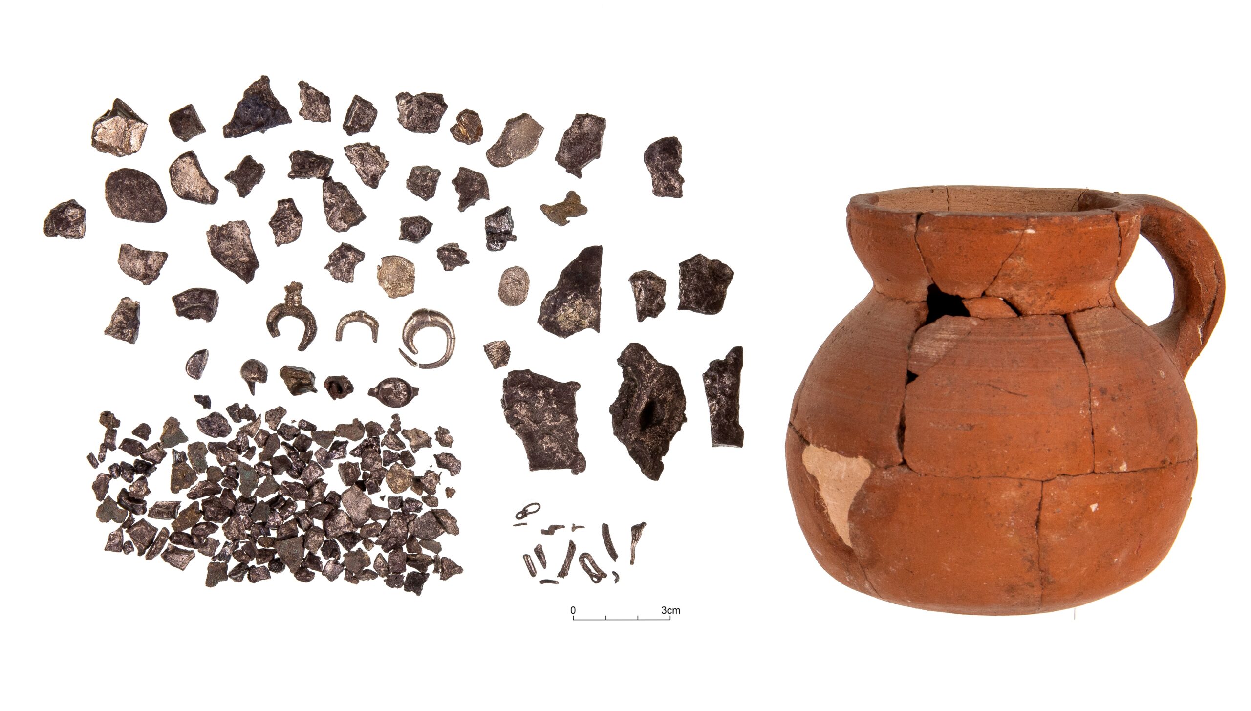 A silver hoard from Tel Arad, found inside a cooking pot and dated around the middle of the eighth century BCE (Courtesy of the Institute of Archaeology, Tel Aviv University; photo by Sasha Flit)