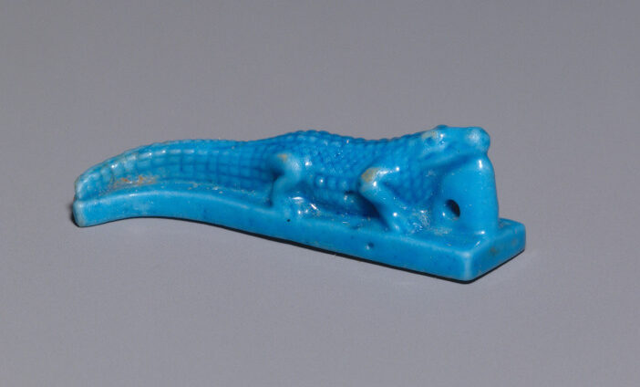 Crocodiles were considered otherworldly creatures in Ancient Egypt and worshiped as deities. This faience amulet from the Ptolemaic period (304–247 BCE) probably depicts Sobek, a benevolent water deity. Metropolitan Museum of Art, New York 1989.281.96. Public Domain.