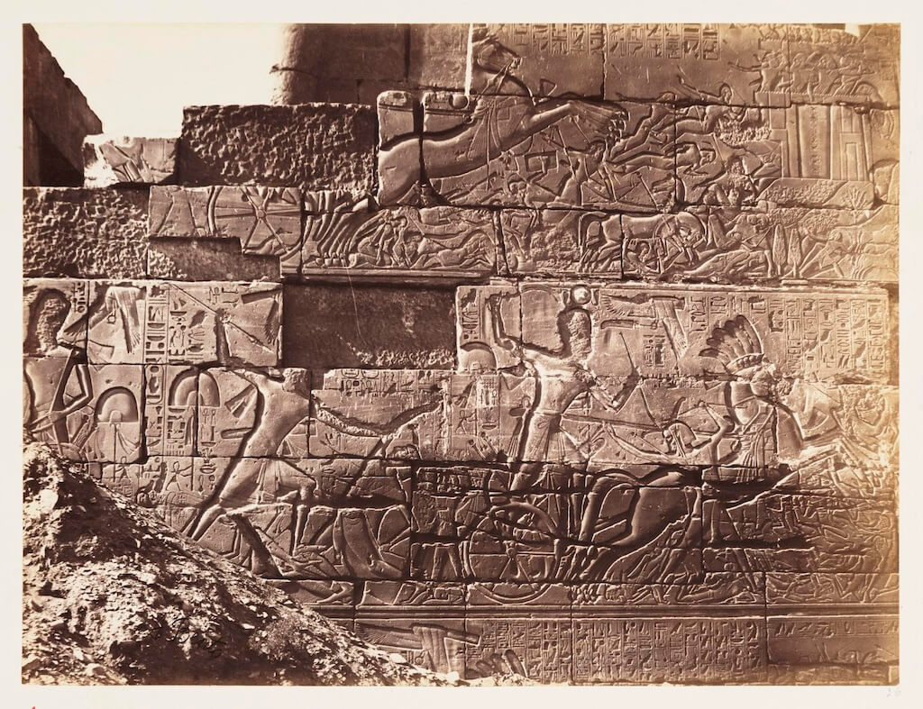 Seti I riding into battle against the Libyans. Temple of Karnak, north exterior wall of the Hypostyle Hall. Unknown photographer, 1883. The National Media Museum, Bradford. Object no. 1995-5001/7/15.