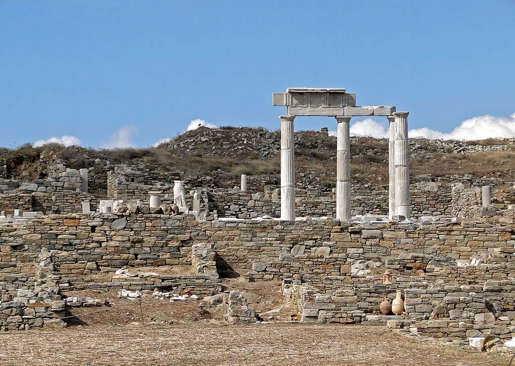 The remains of the club house of the Poseidoniasts of Berytus, a Phoenician professional association, on Delos. Ca. 3rd century BCE. Photo by Bernard Gagnon, CC By-SA.