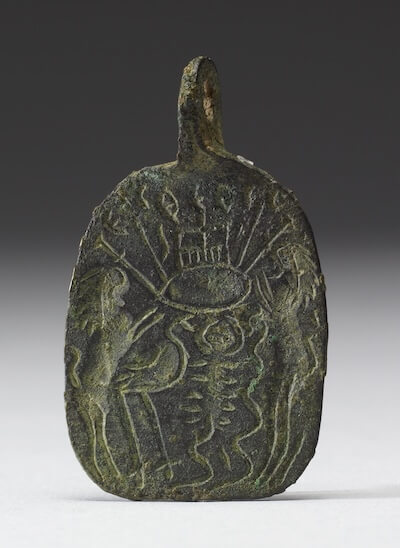 Amuletic pendant made of copper alloy. On top: the Holy Rider spears a fallen enemy (these figures are sometimes identified as Solomon and Lilith). On bottom: image of the “much suffering eye” attacked by a lion, snake, scorpion, stork, and various weapons. 5th or 6th century CE. Said to be from Israel. Walters Art Museum 54.2653. Photos: CC0 1.0 (Public Domain).