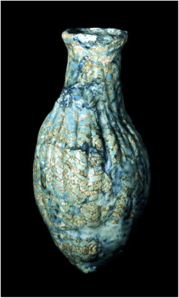 Kassite, core-formed, glass vessel showing weathering. Ur, 1200-1300 BCE, British Museum 120659. © The Trustees of the British Museum.