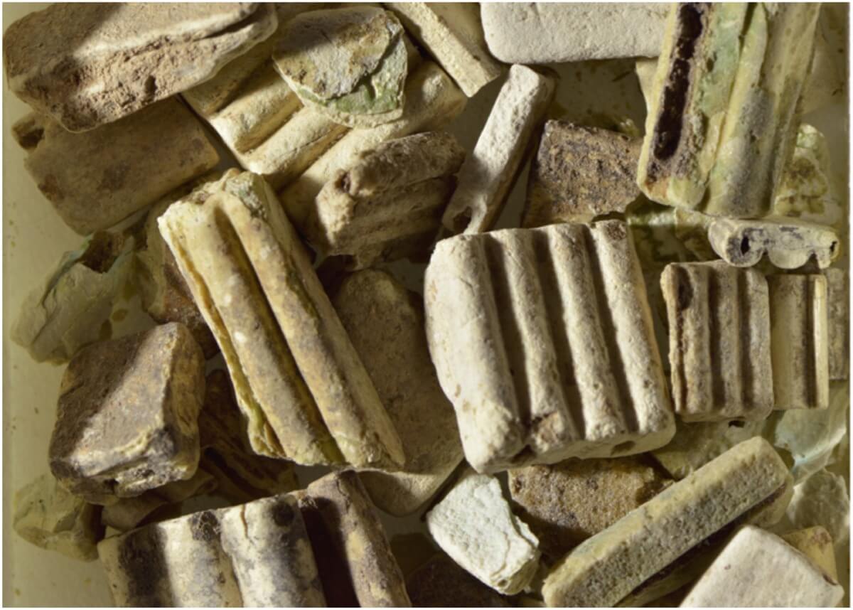 Weathering patterns on vitreous materials. Here spacer beads from the City of Nuzi are weathered by water to make them white and very delicate. They would almost certainly all have been a brilliant blue colour. from Harvard Museum of the Ancient Near East.