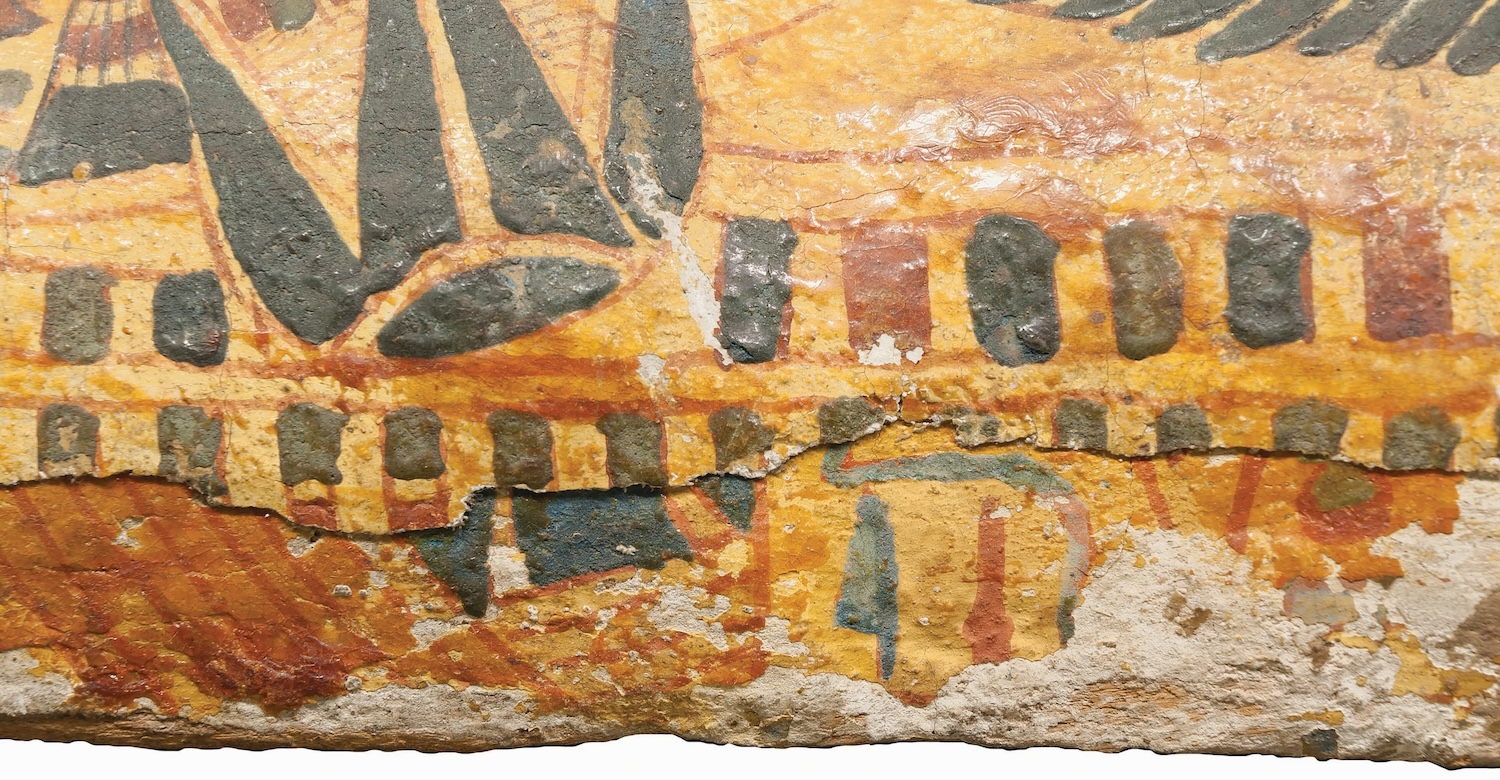 Detail of the Twentieth Dynasty inner coffin lid of Muthotep (BM EA 29579). The Twentieth Dynasty exterior decoration was painted directly over a Nineteenth Dynasty layer of decoration. © The Trustees of the British Museum.