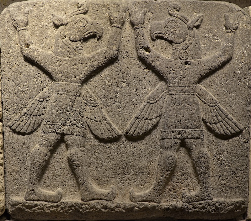 Relief orthostat depicting two human-bird hybrids. From Carchemish, Türkiye, Late Hittite period (9th – 7th century BCE). Museum of Anatolian Civilization, Ankara. Photo by Carole Raddato, CC by-SA 4.0
