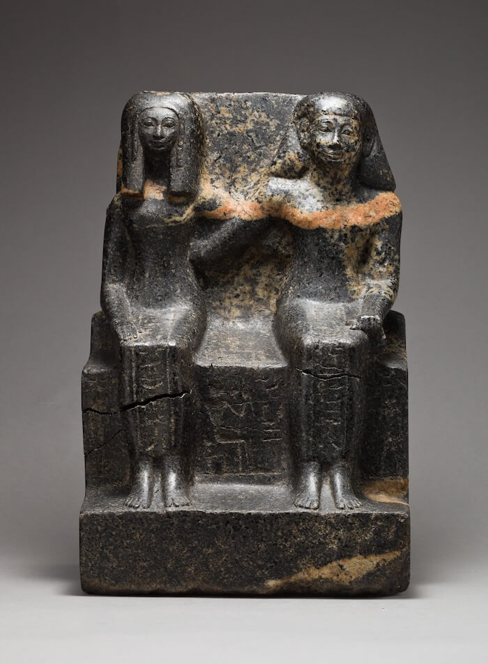 Pair Statue of the Lady of the House Rennefer and the Overseer of Craftsmen Neferkhawet, c. 1478 – 1450 BCE. Metropolitan Museum of Art, 2012.411.