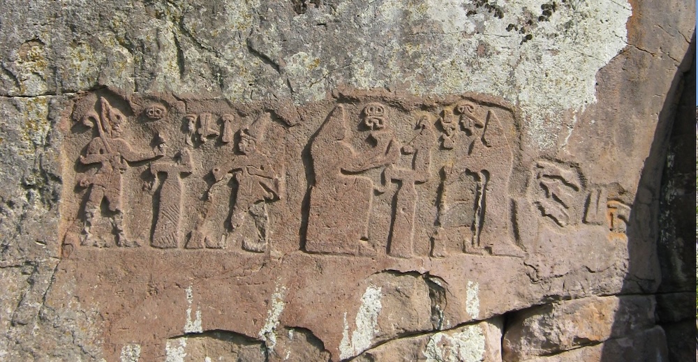 Great King Hattušili III and Queen Puduhepa pour libations to the Storm God and Sun Goddess at Fıraktın. Photo by Krähenstein, CC By-SA 3.0