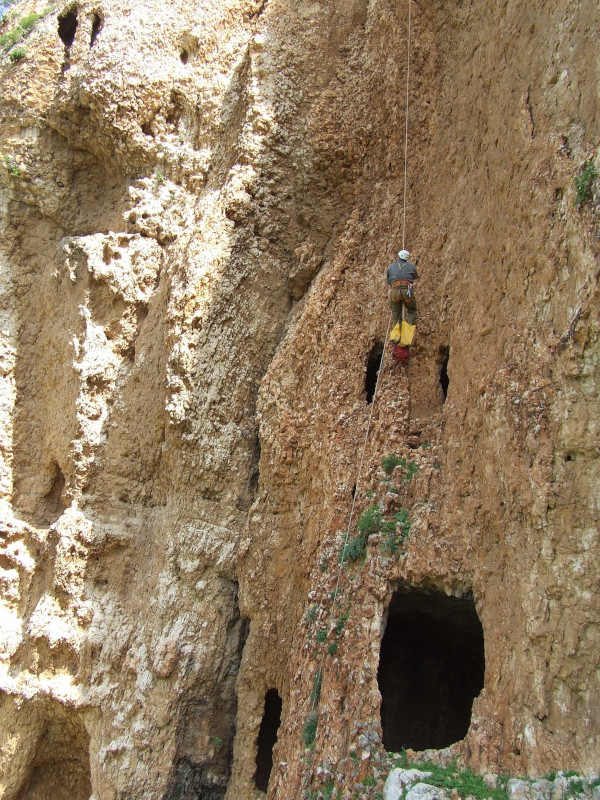 Rappelling into a cliffs shelter Arbel cliff. Photo courtesy Yinon Shivtiel.