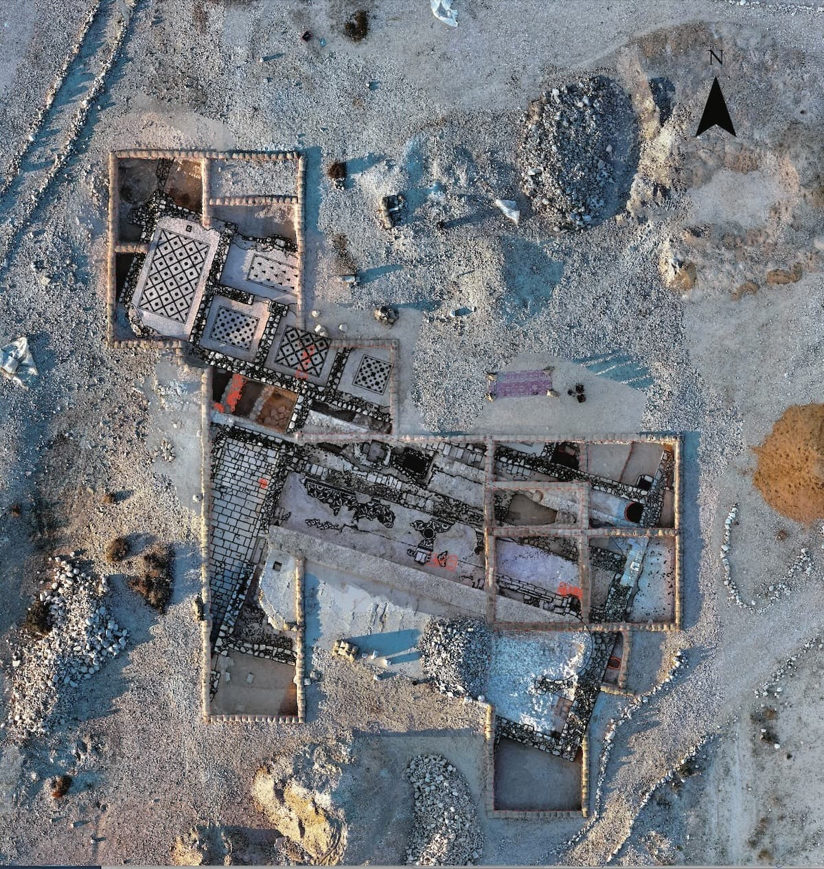 Aerial photo of the excavations in the northern area with architectural drawing overlay highlighting the walls and mosaic floors of a large basilica church excavated in 2026. Photo and plan by Yakov Shmidov. ©Nessana Expedition