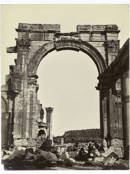 Ruins of the monumental street arch at Palmyra, author unknown, c. 1900 CE. Image courtesy of The Miriam and Ira D. Wallach Division of Art, Prints and Photographs: Photography Collection, The New York Public Library. TMS Object Number: 101PH020.171