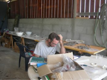 Peter Stone, looking for comparative data on excavated pottery. Photo by author. Courtesy of the Tel Kedesh Excavations.